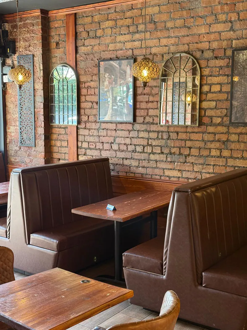 Booths against the brick wall