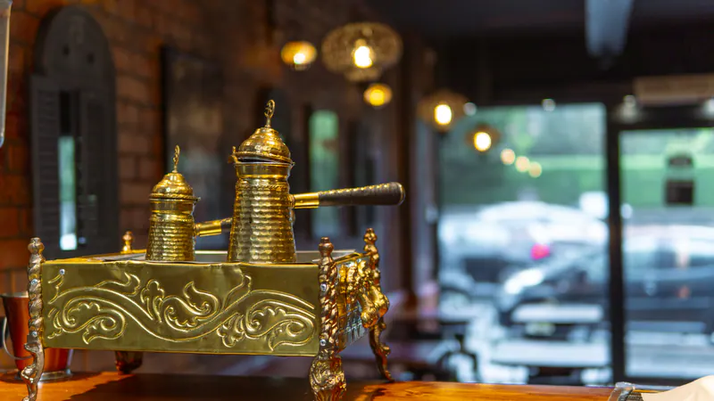 Brass Arabic coffee set on the counter